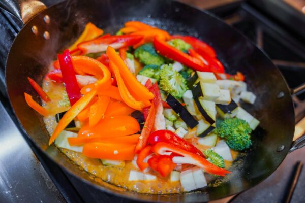 Cooking vegetables for Thai red curry